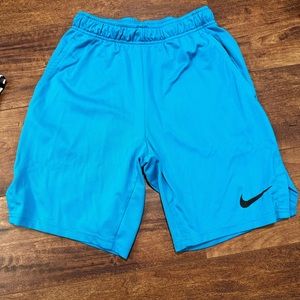 Blue Nike shorts size small